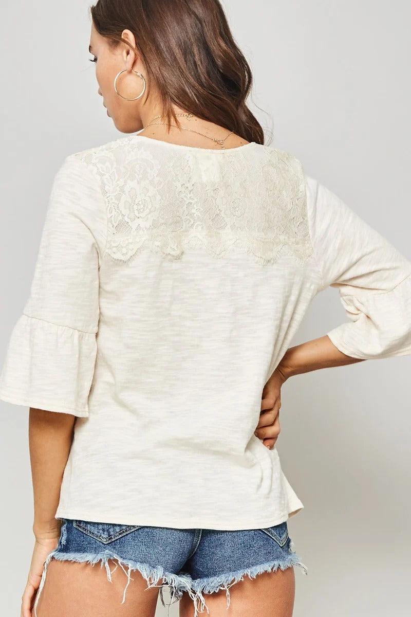 A Knit Top With Deep V Neckline And Yoke Design - Boutique Fashionistah